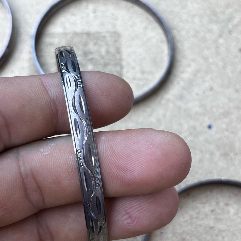 4 metal embroidered bracelets
